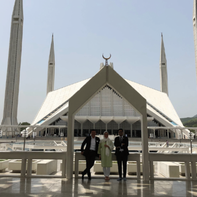 Bavarian Business Delegation to Pakistan, April 2019. The Faisal Mosque is located on the foothills of Margalla Hills in Islamabad, the mosque features a contemporary design consisting of eight sides of concrete shell and is inspired by a Bedouin tent. The mosque is a major tourist attraction, and is referred to as a contemporary and influential feature of Islamic architecture.